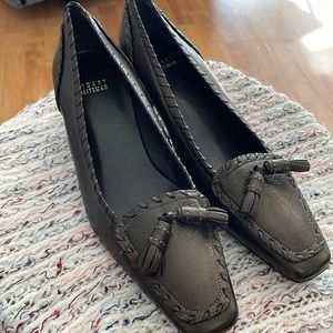 Stuart Weitzman brown bronze kitten heel leather slip on . Never worn . Size 9.